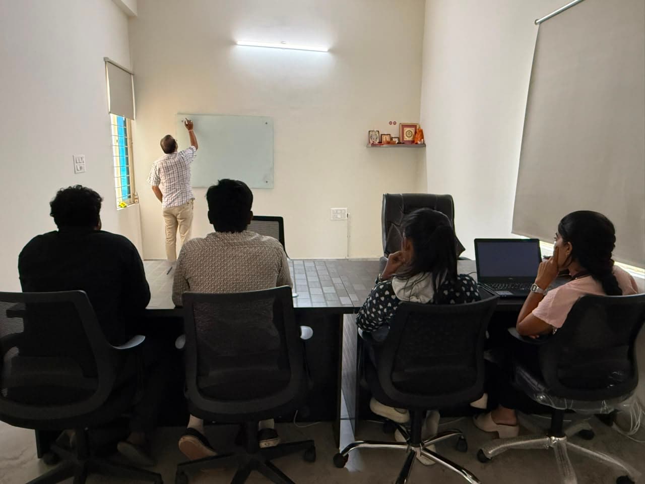 EvoGenix team participating in an internal meeting